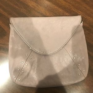 Grey leather clutch with studs and chain strap